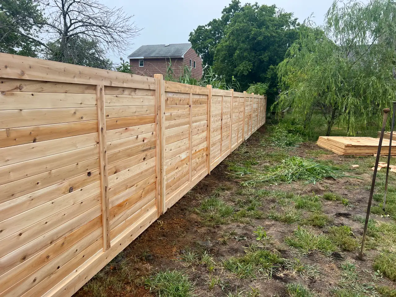 Tan vinyl privacy panels residential NJ — Segura Fence LLC
